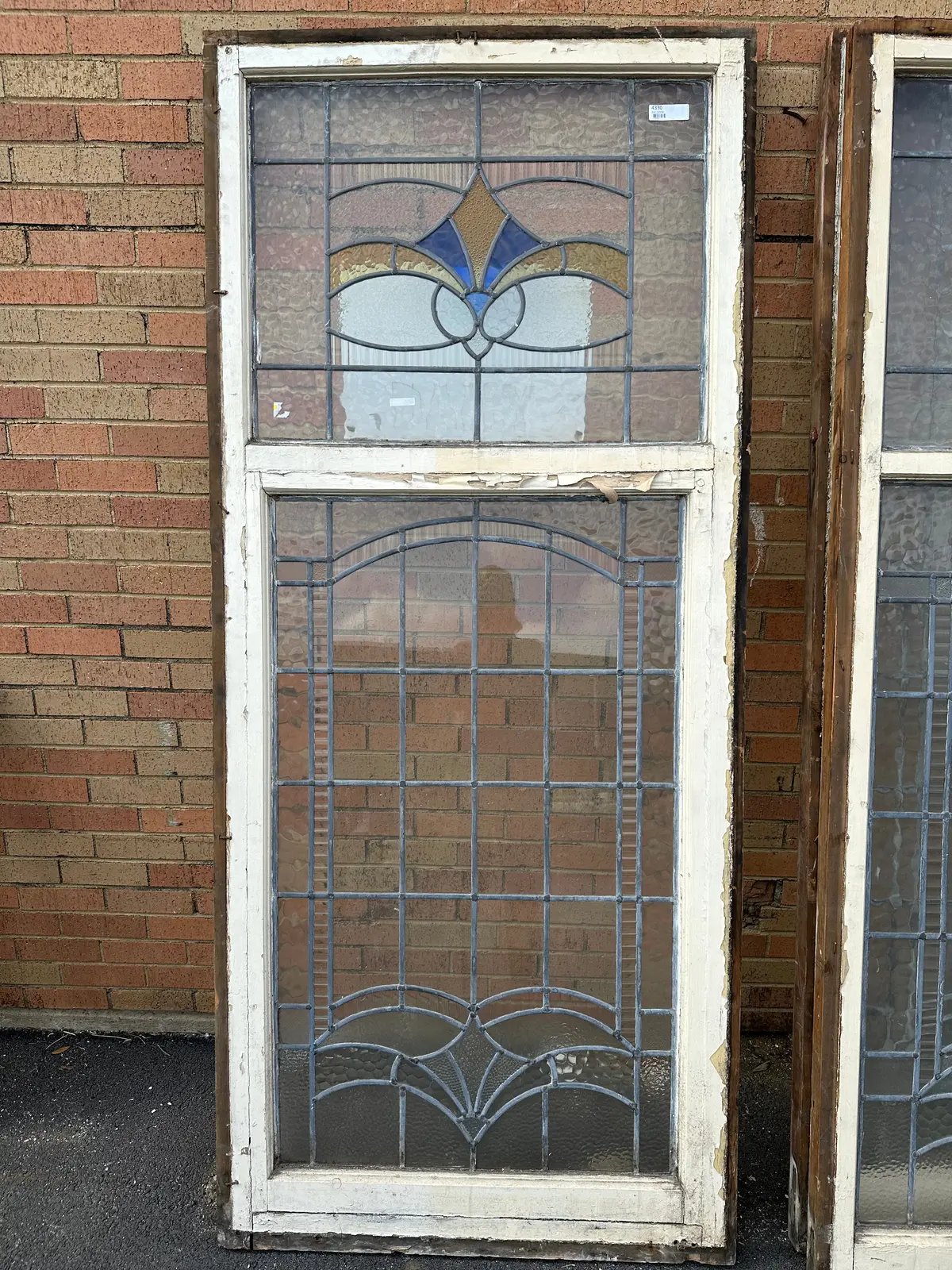 Tall Stained Glass Window With Yellow And Blue Top 1