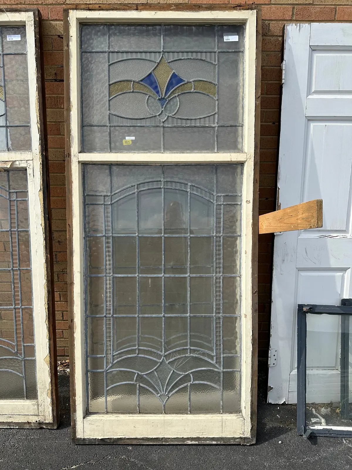 Tall Stained Glass Window With Yellow And Blue Top 1