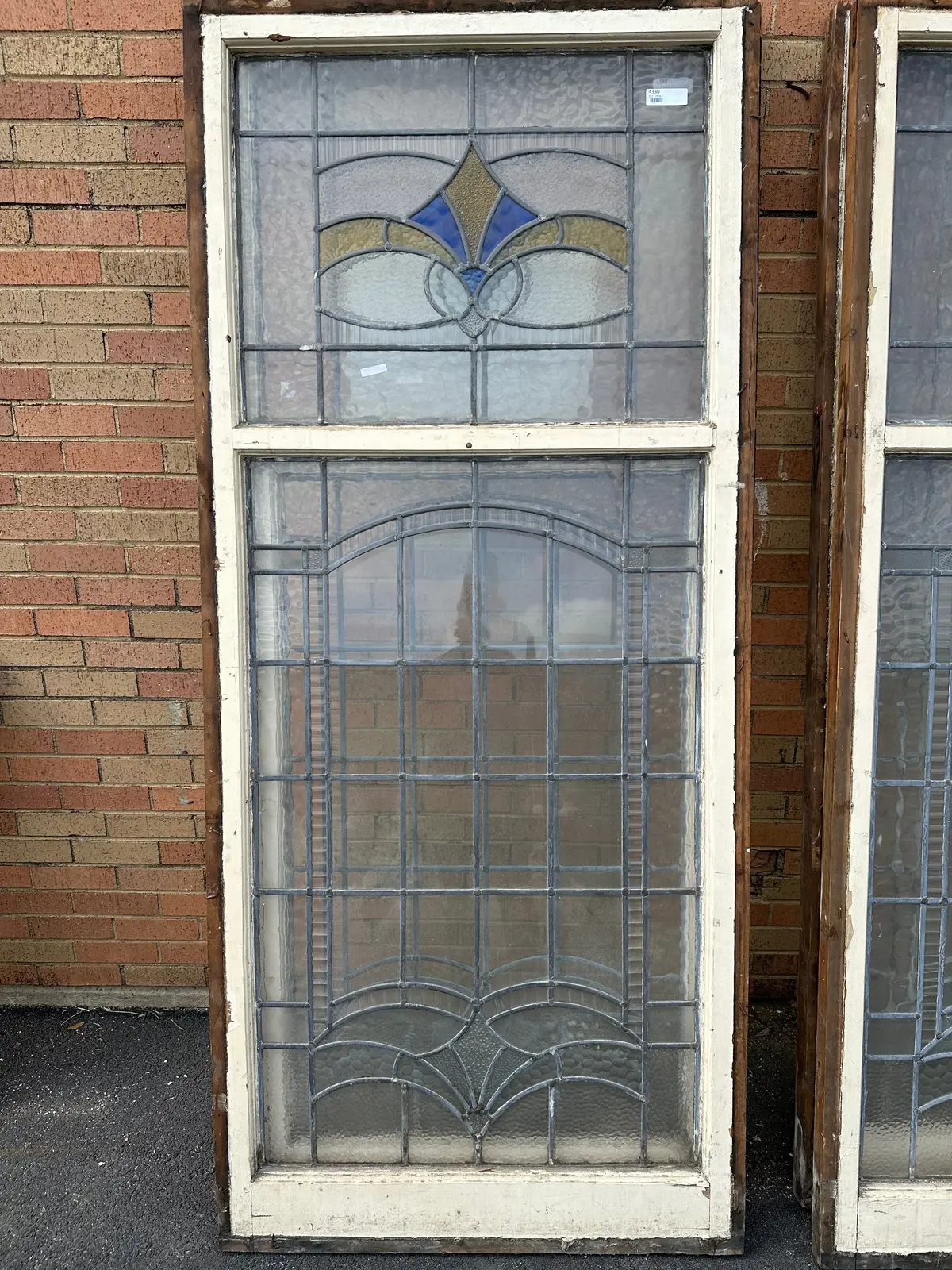 Tall Stained Glass Window With Yellow And Blue Top Open Transom 1