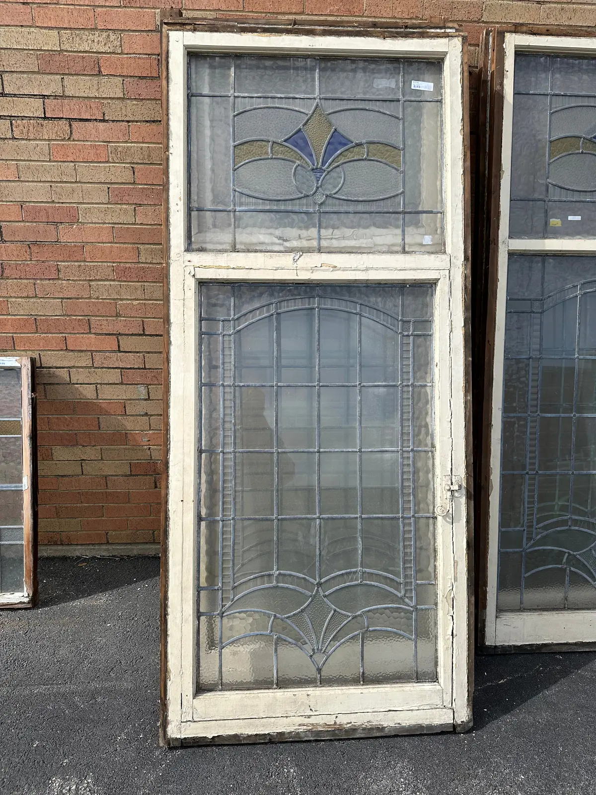 Tall Stained Glass Window With Open Bottom Window And Yellow Blue Top 1