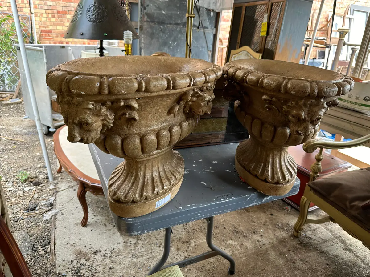 Pair Of Plaster Urns With Lion Faces 1