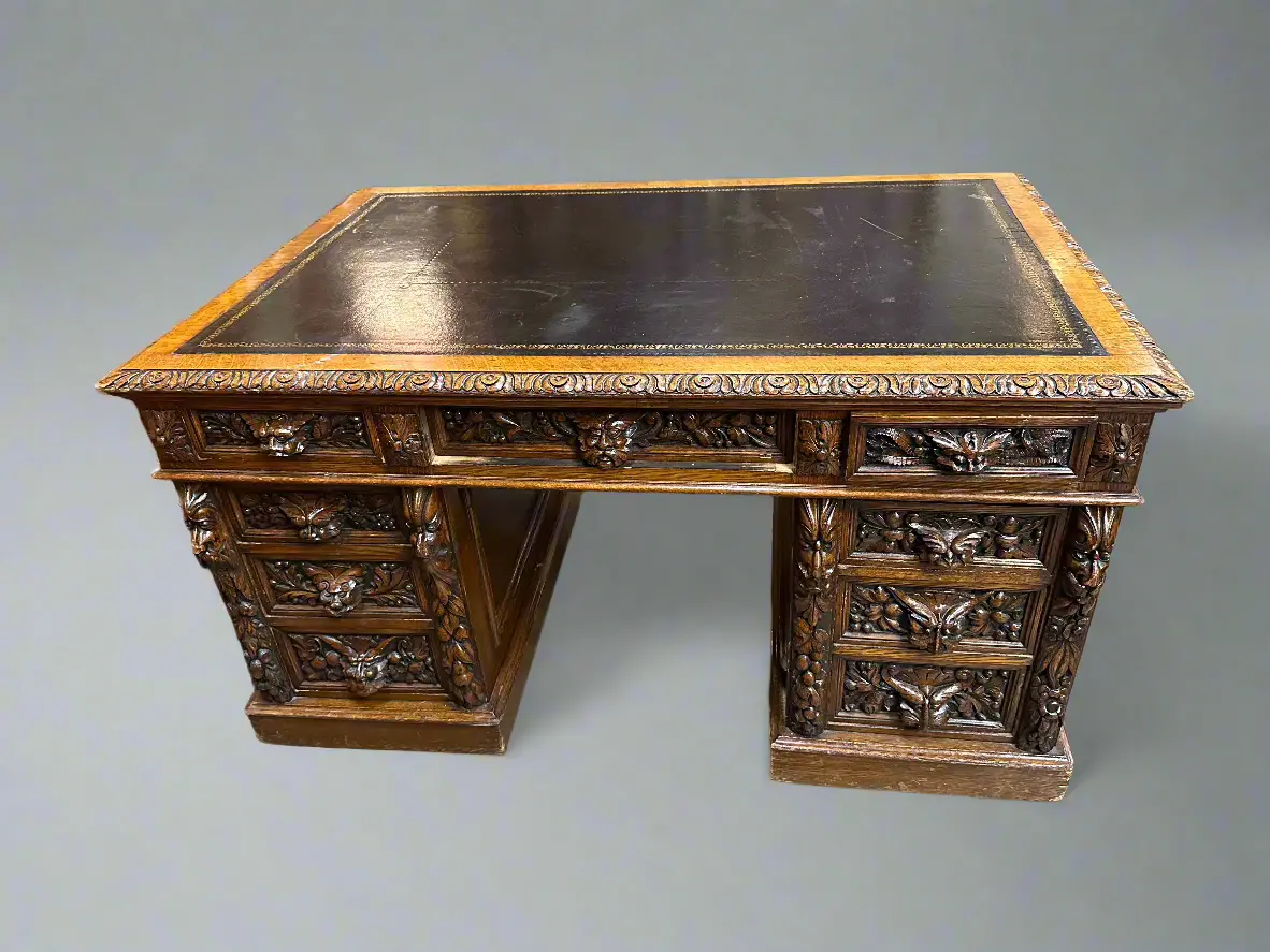 Small Carved Oak Partners Desk With Black Leather Top 1