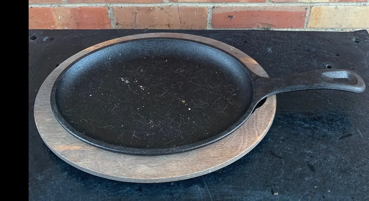Oval Cast Iron Handled Pan With Wood Base 1