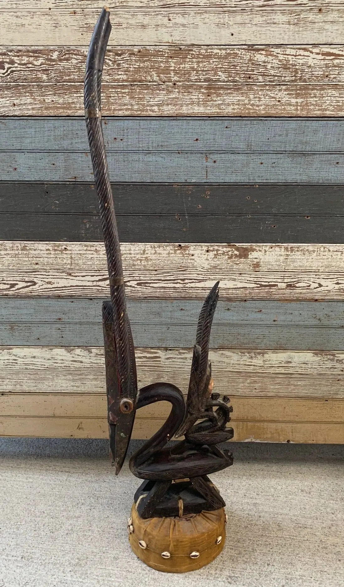 Carved African Horned Animal On Woven Base 1