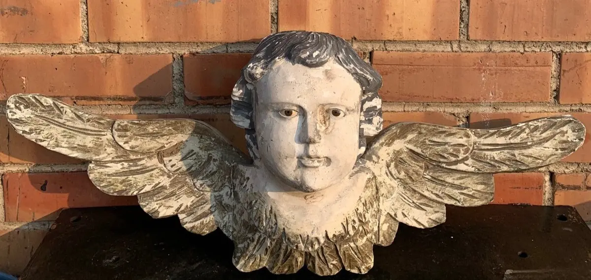 Carved Putti With Glass Eyes 1