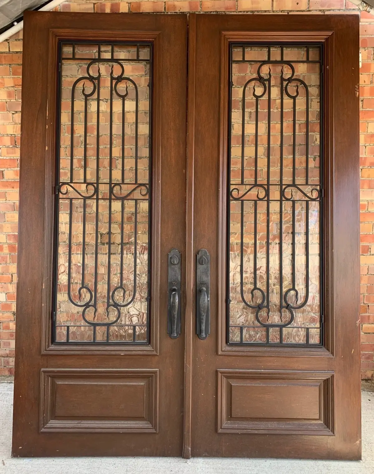 Pair Of Large Mahogany Doors With Iron Inserts 1