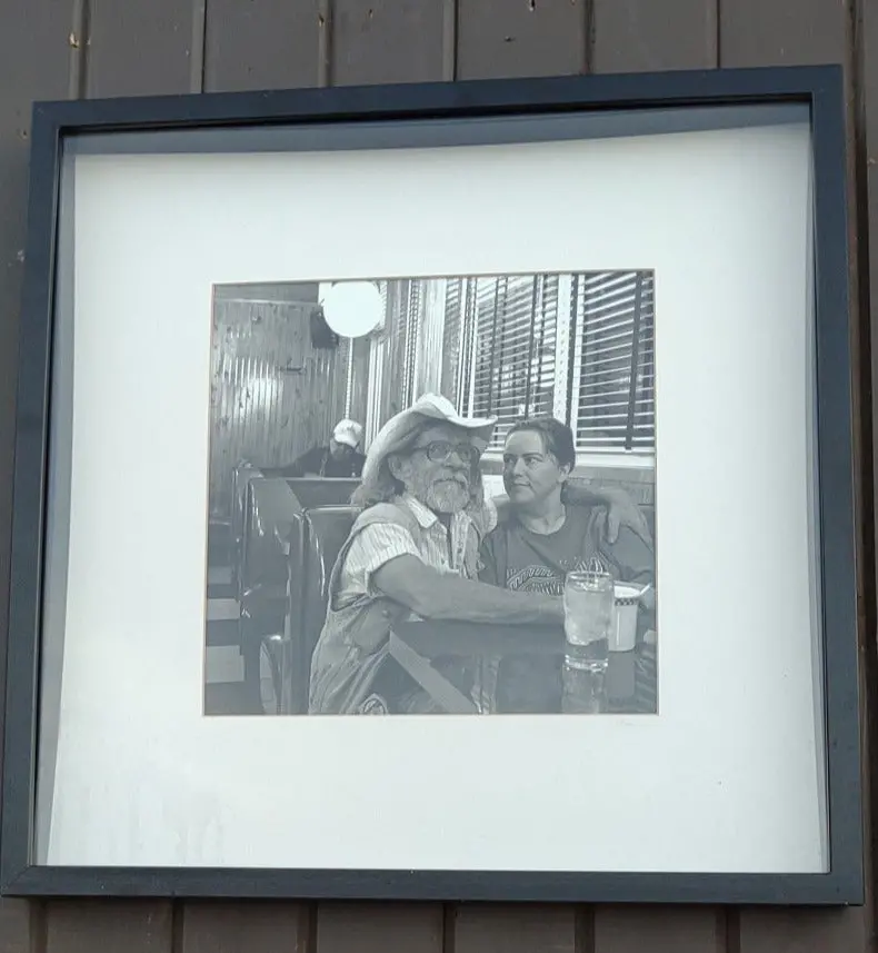 Framed Photo Of Bearded Man And A Woman In A Restaurant 1