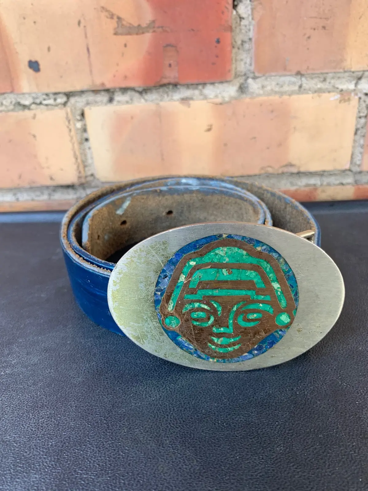 Green And Silver Buckle With Face Of Indigenous Person On Belt 1