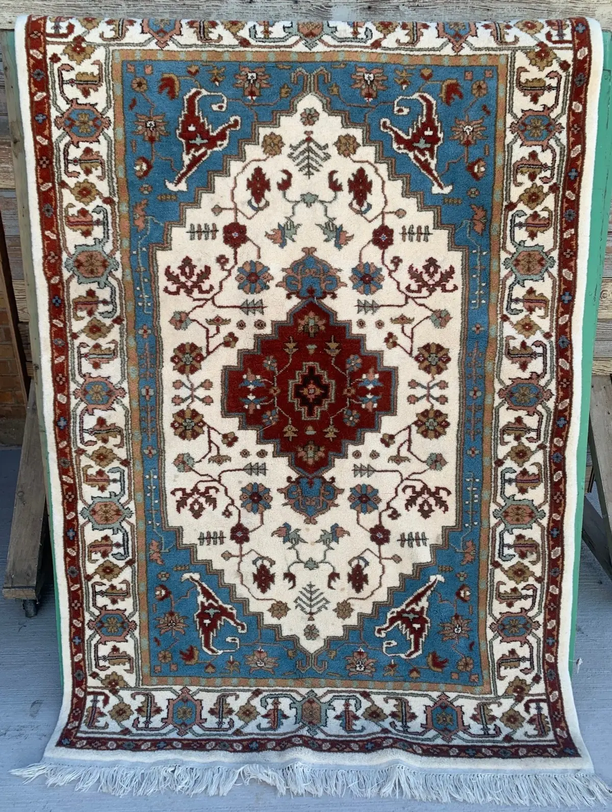 Beige, Blue, And Rust 4' X 6' Rug 1