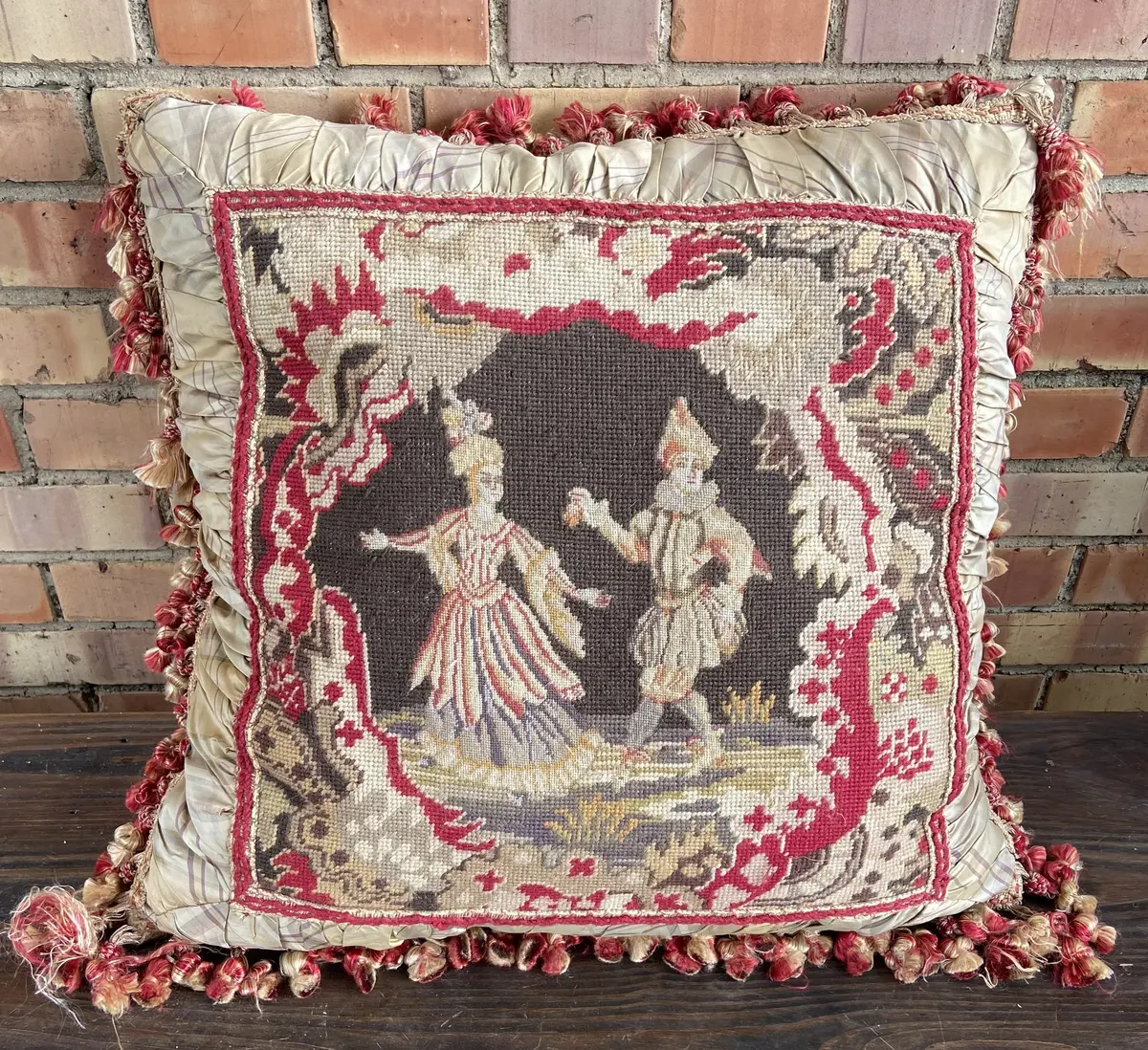 Needle Point Pillow Of People With Tassels 1