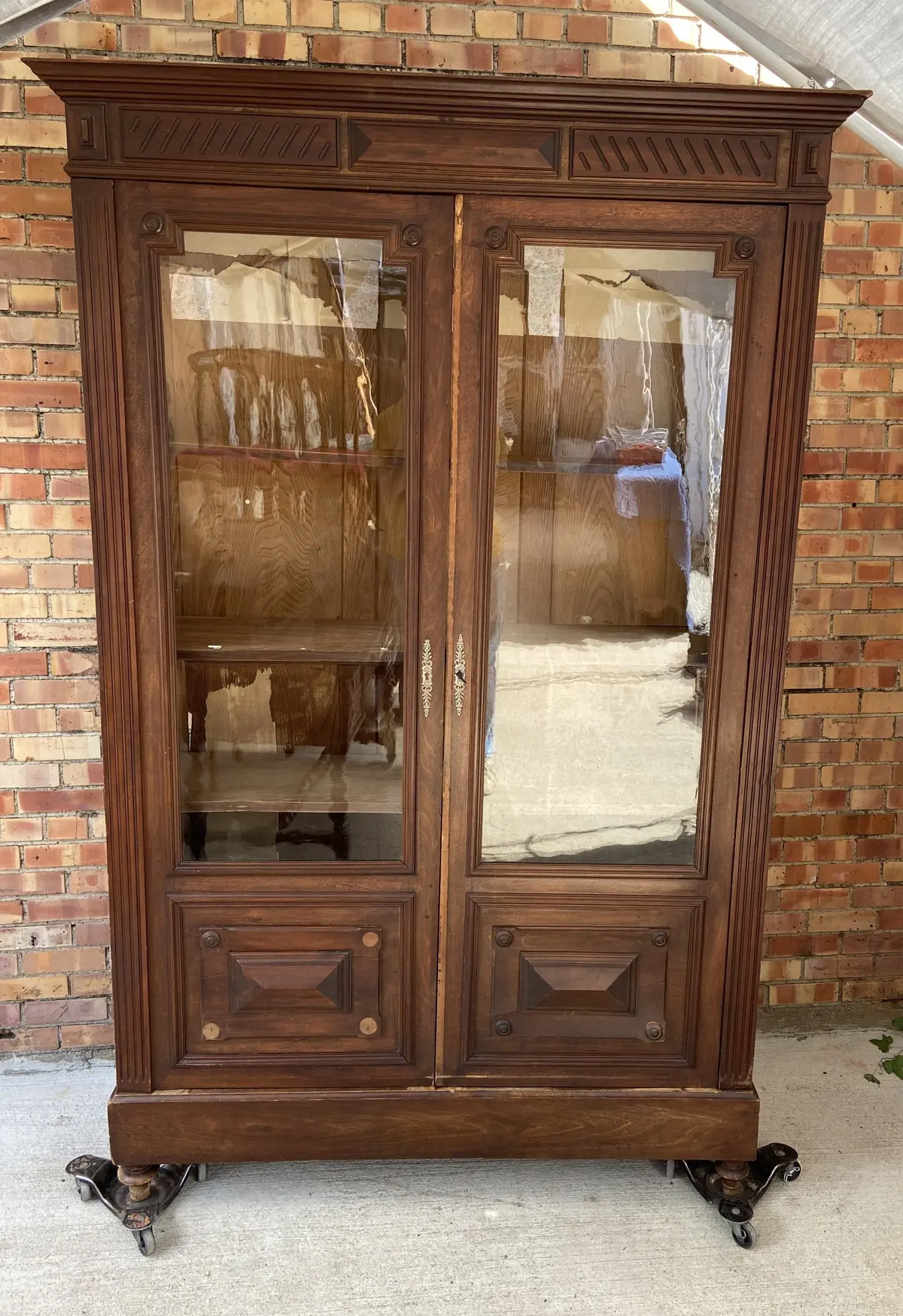 Henri Ii Walnut Bookcase With Wavy Glass Doors 1
