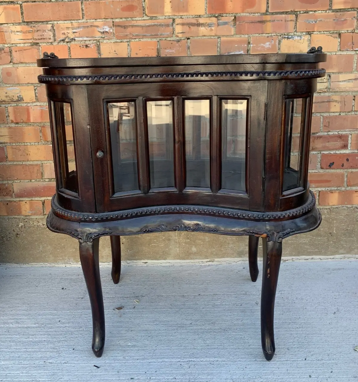 Chocolate Kidney Shaped Cabinet With Beveled Glass And Removable Tray 1