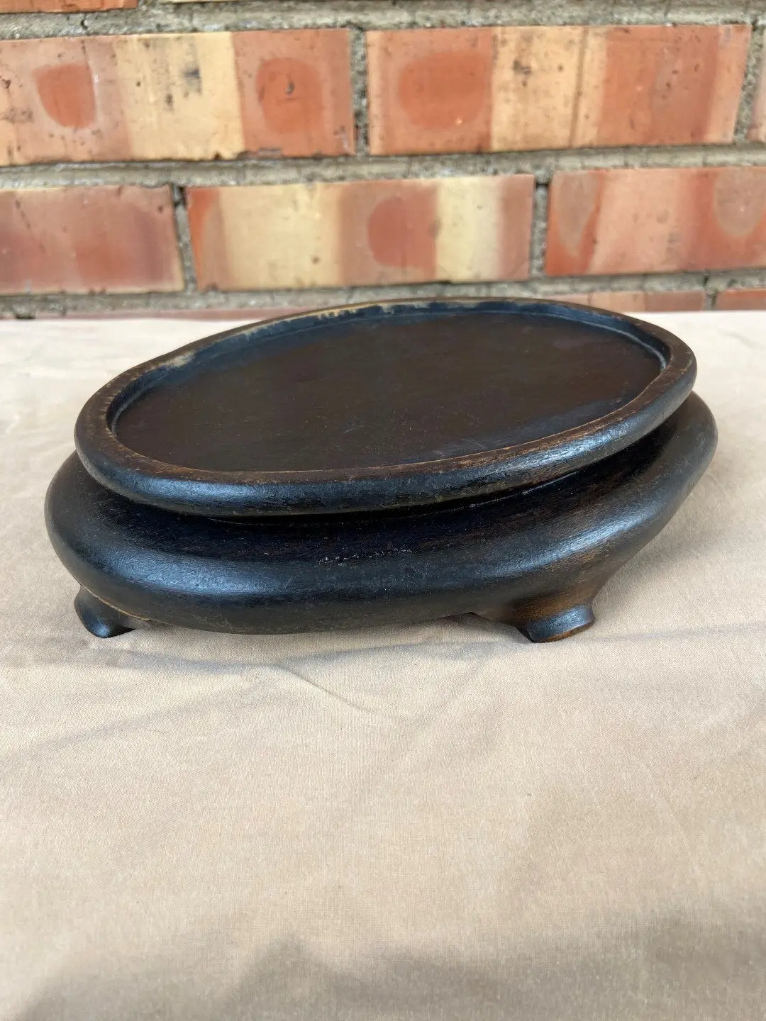 Small Black Oval Stand 1