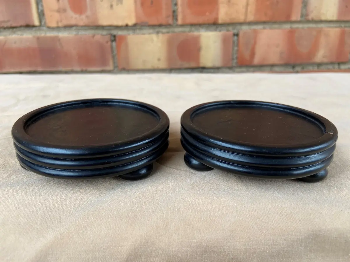 Pair Of Small Round Footed Stands 1