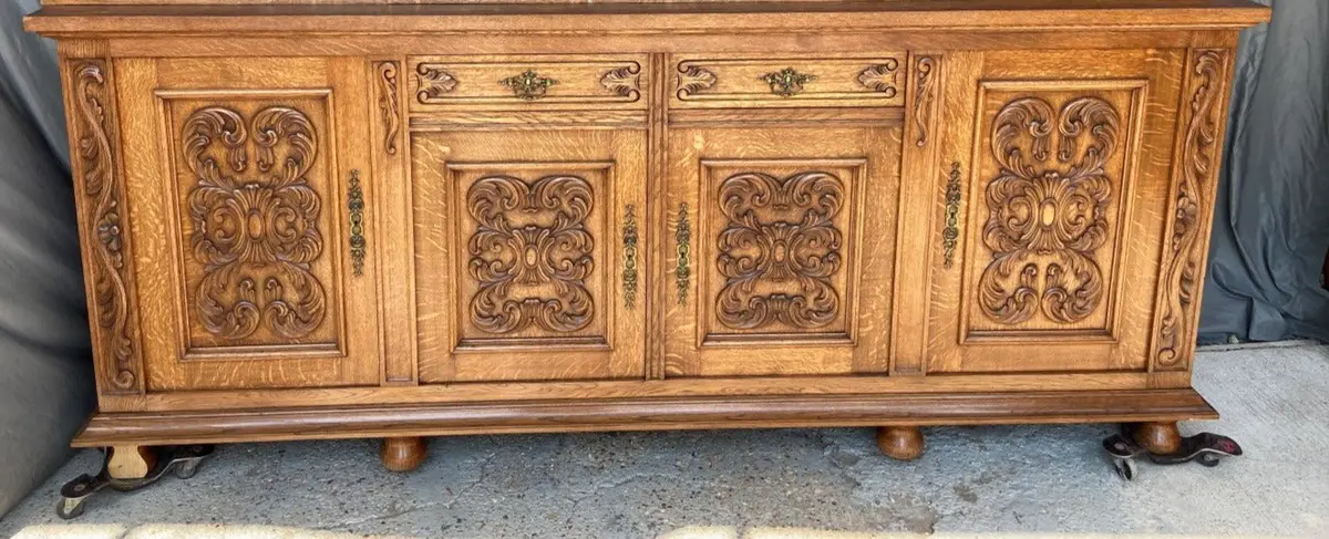 Oak Carved Panel Sideboard With Bun Feet 1