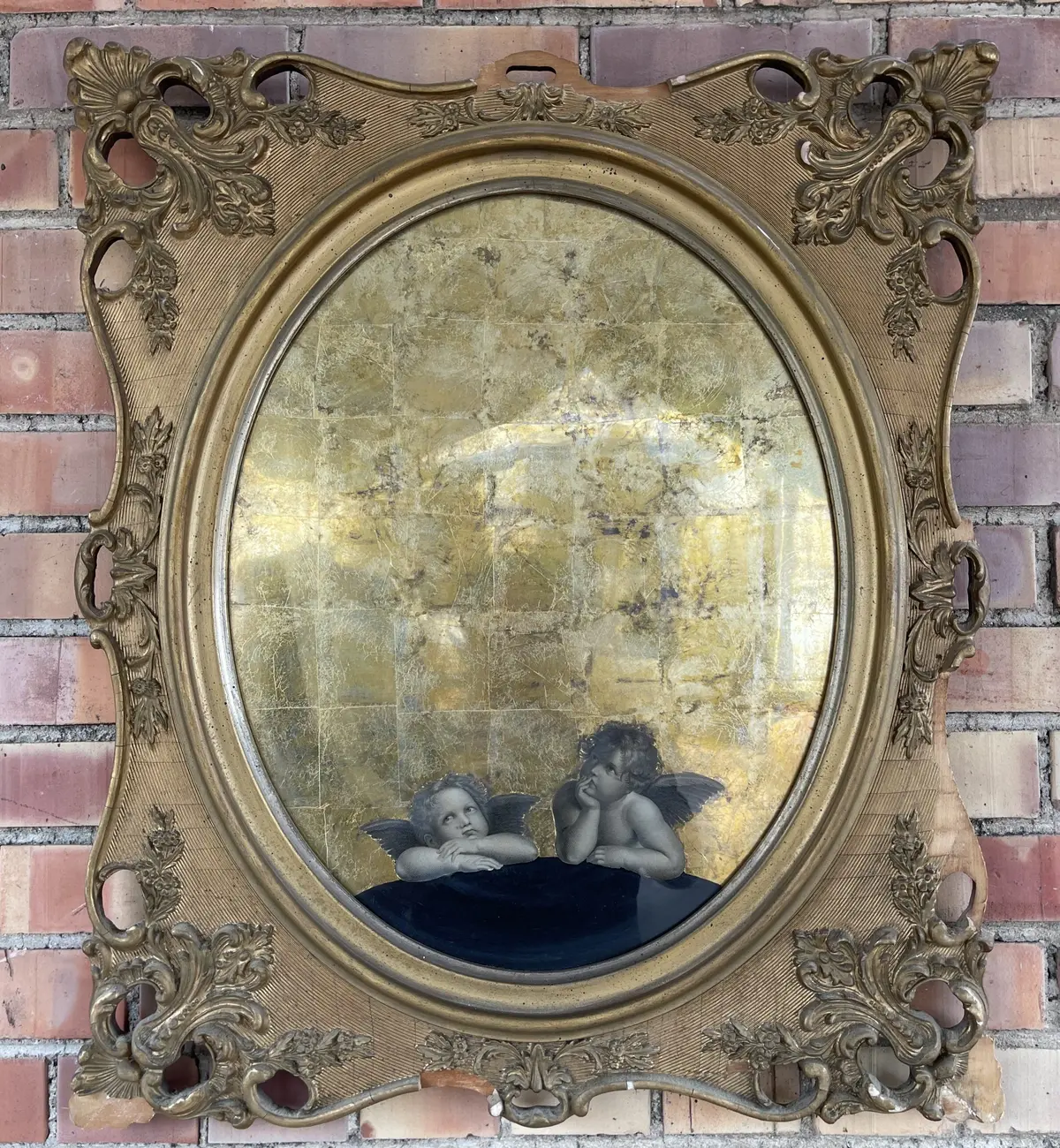 Wood And Gesso Oval Framed Mirror With Putti 1