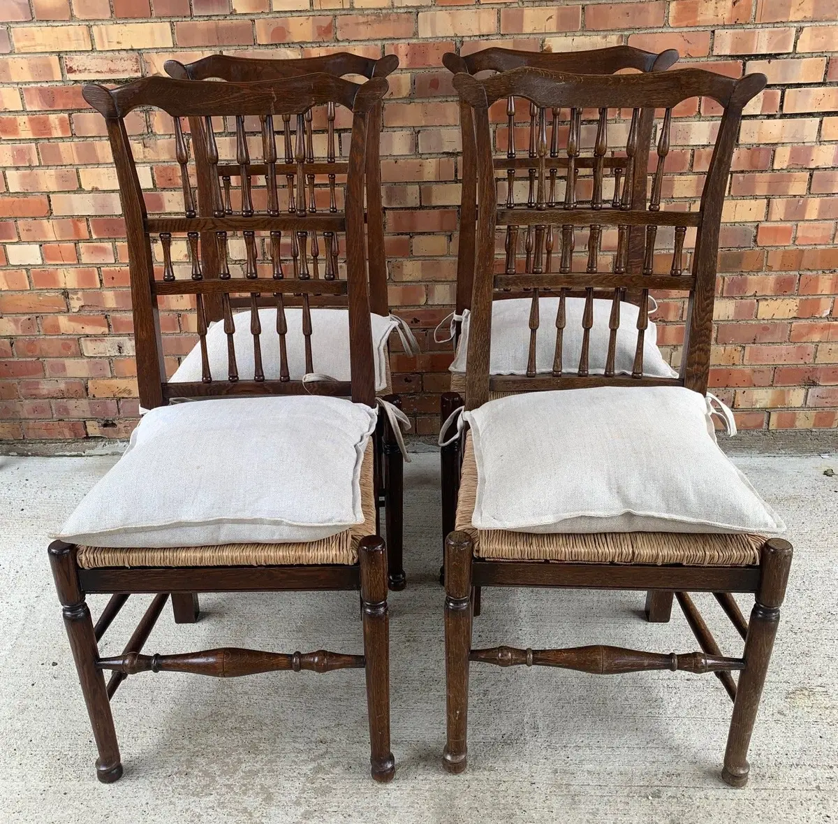 Set Of 4 Oak Spindle Rush Seat Chairs With Linen Cushions 1