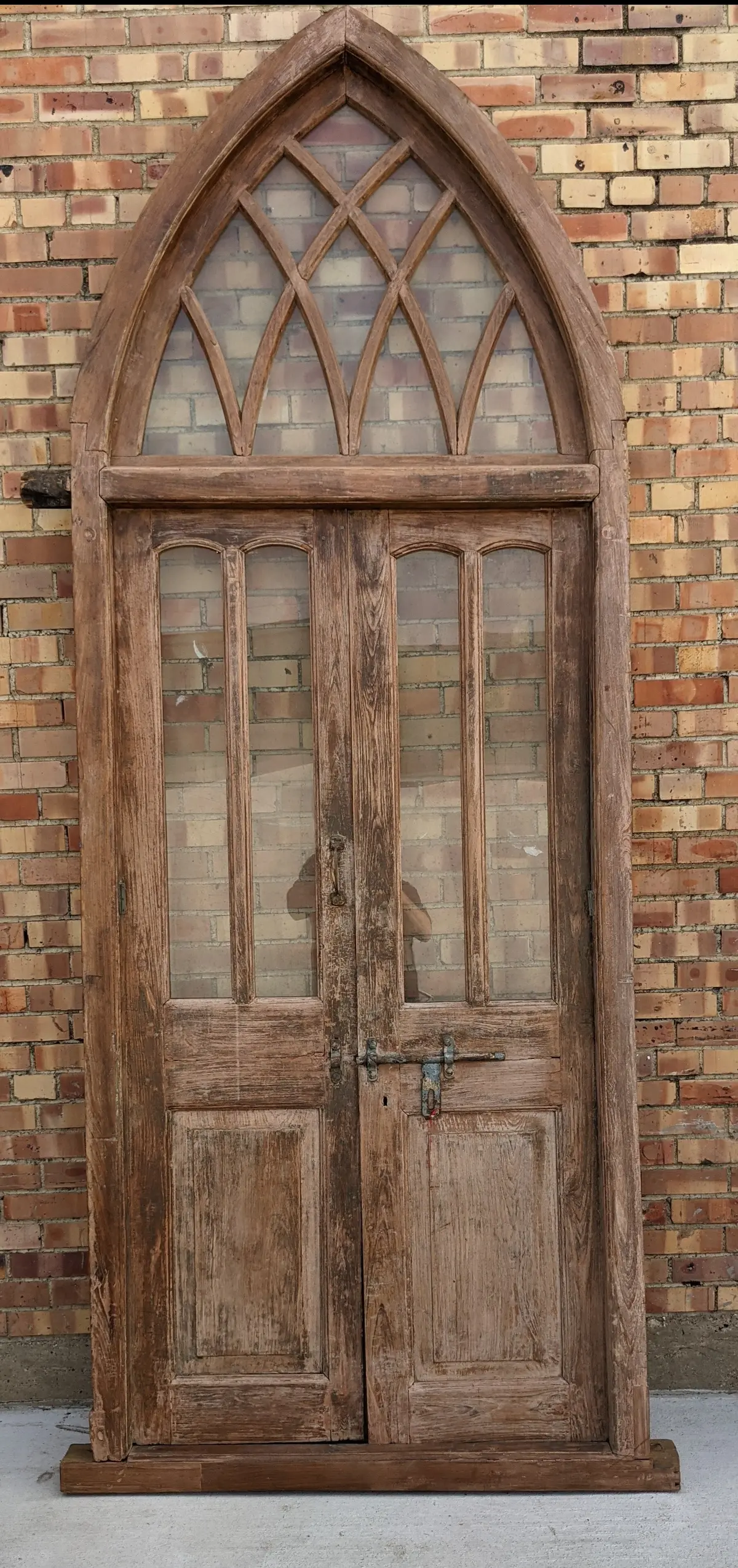 Pair Of Wood Doors In Gothic Arch Transom Frame 1