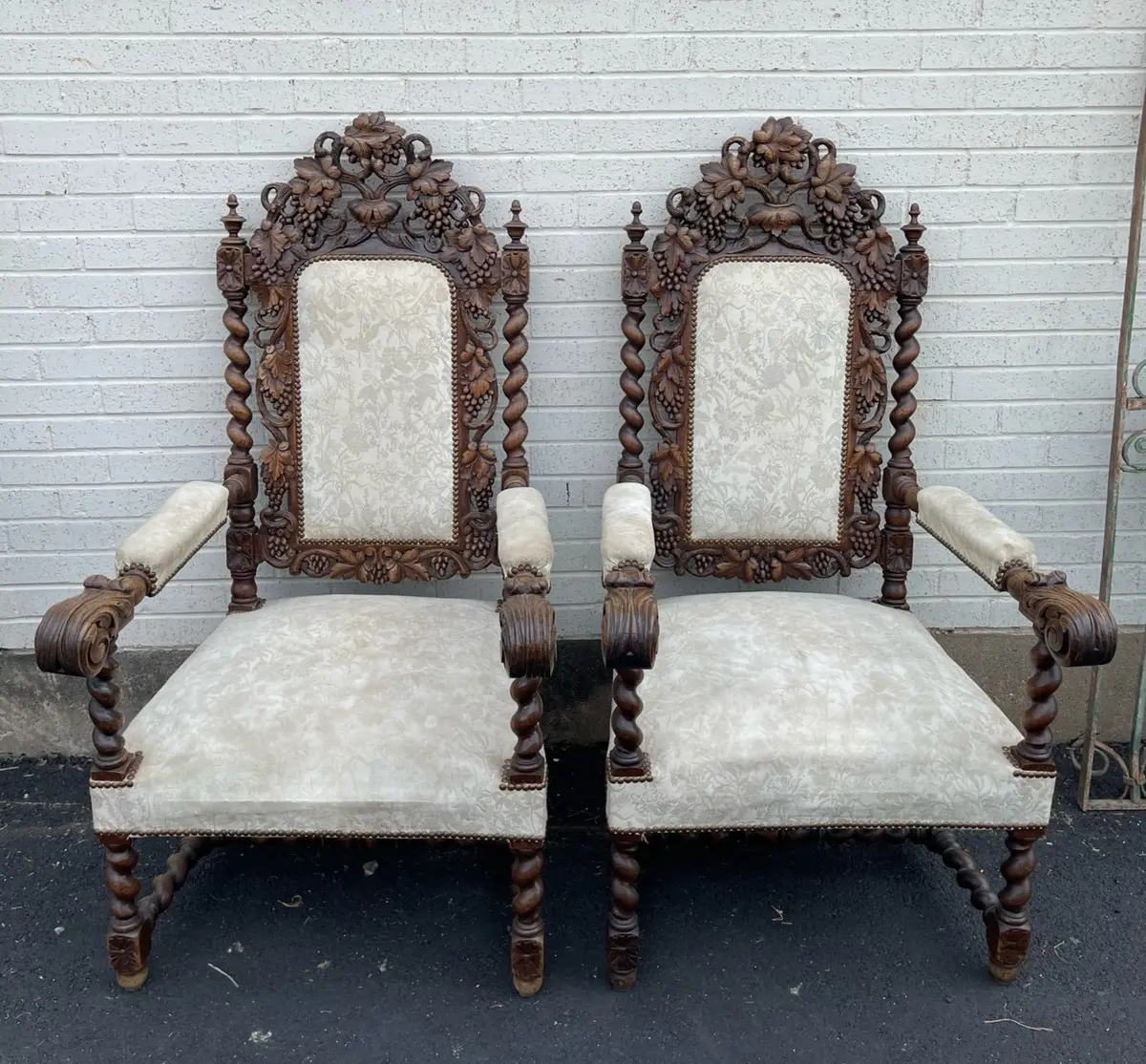 Pair Of Barley Twist Throne Chairs With Feather Carved Arms And Grape Crests 1