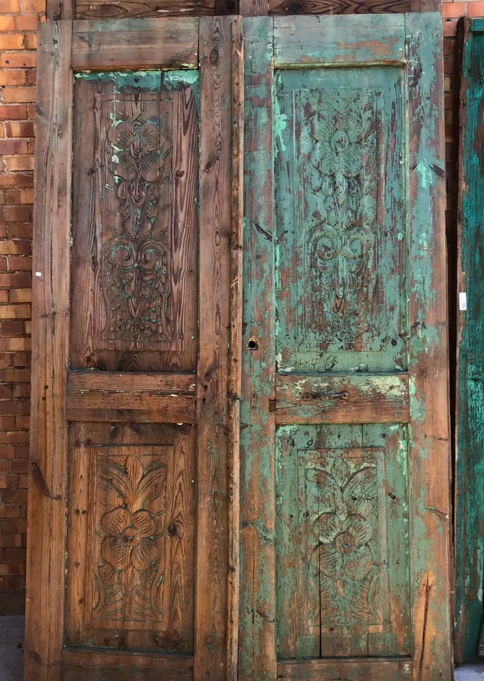 Pair Of Pine Doors With Carved Flowers And Partial Green Paint 1