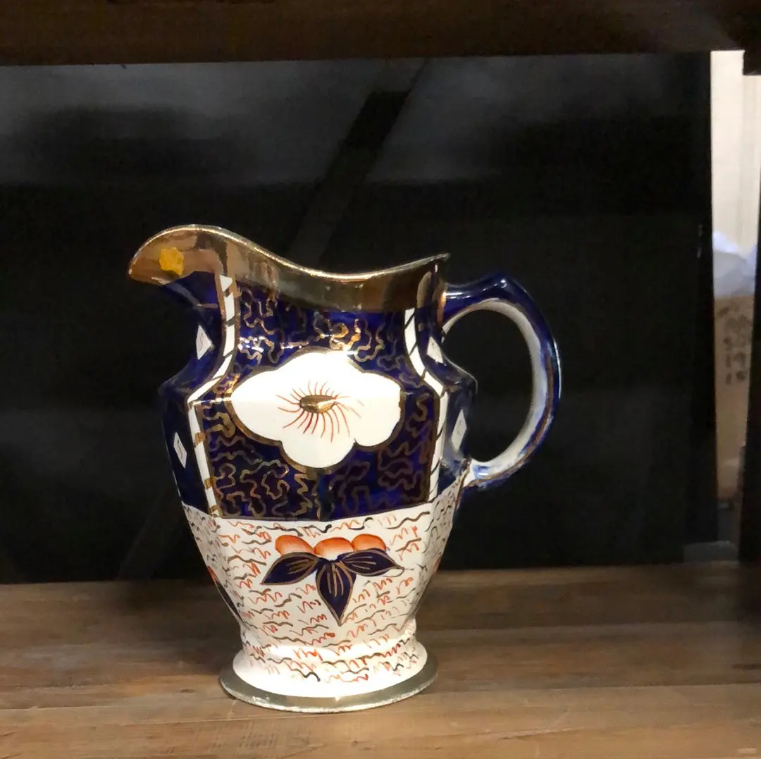 Gaudy Welch Orange And Blue Pitcher 1