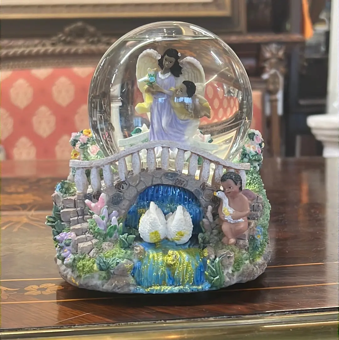 Angel And Child Snowglobe 1