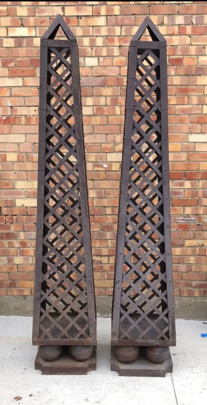 Pair Of Tall Metal Obelisks 1