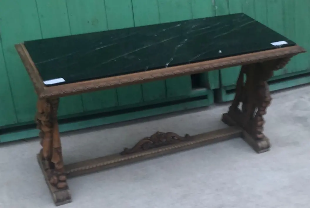 Large Carved Angel Table With Black Marble Top 1