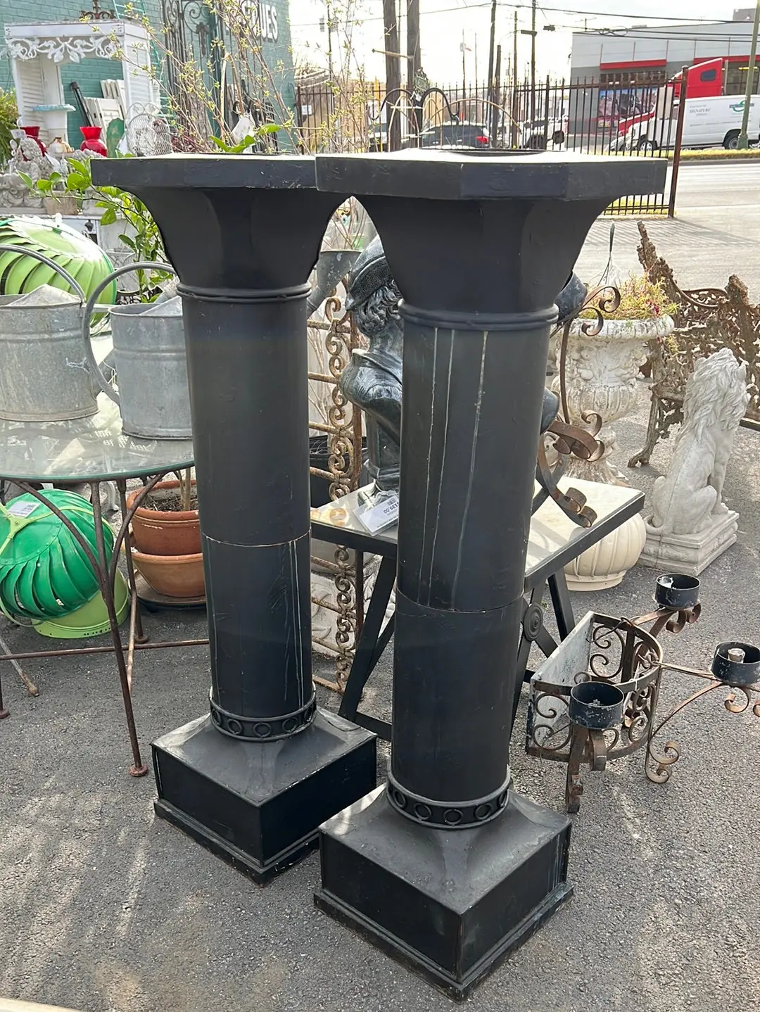 Pair Of Black Metal Columns With Planter Tops 1