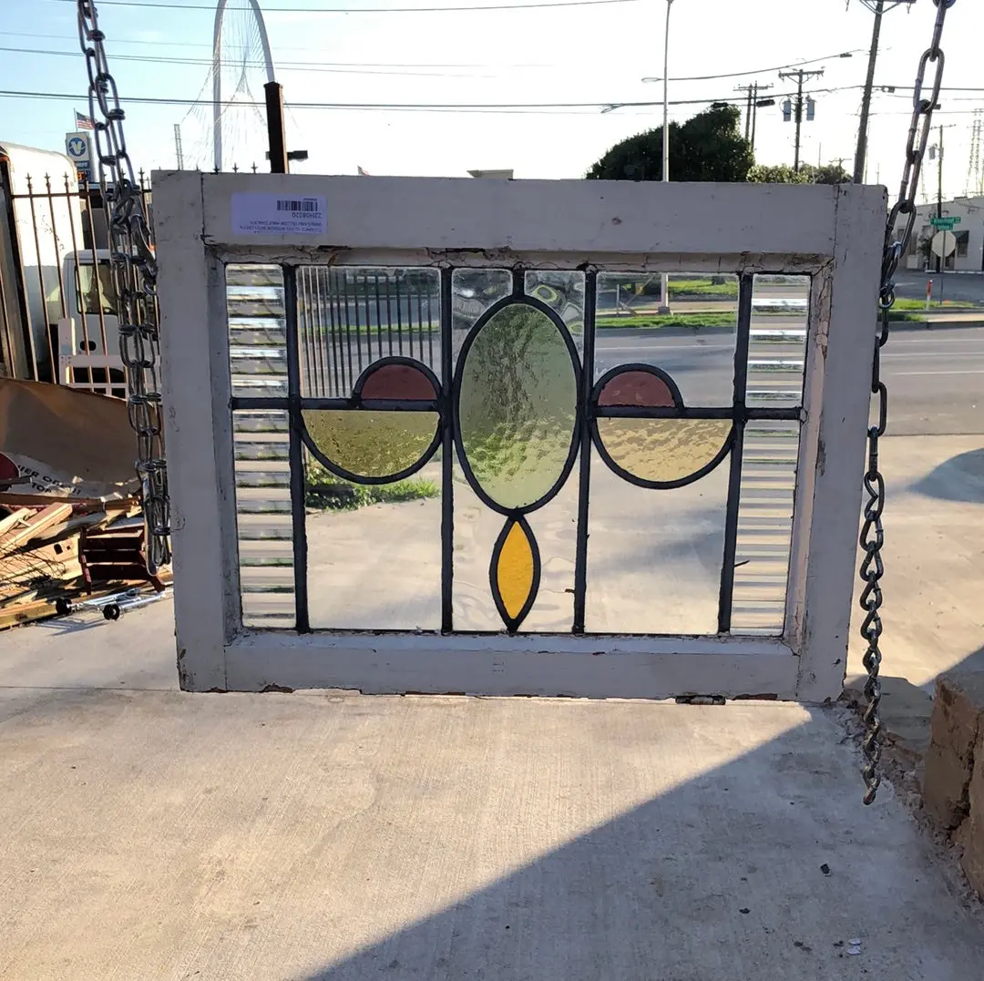Stained  Glass Window With Green Ovals And Yellow Half Ovals 1