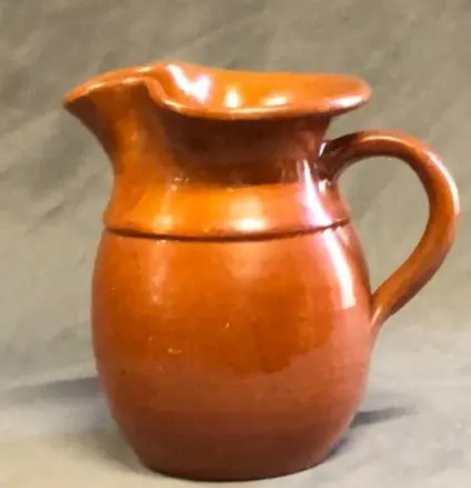 Small Hand Thrown Orange Pottery Pitcher 1