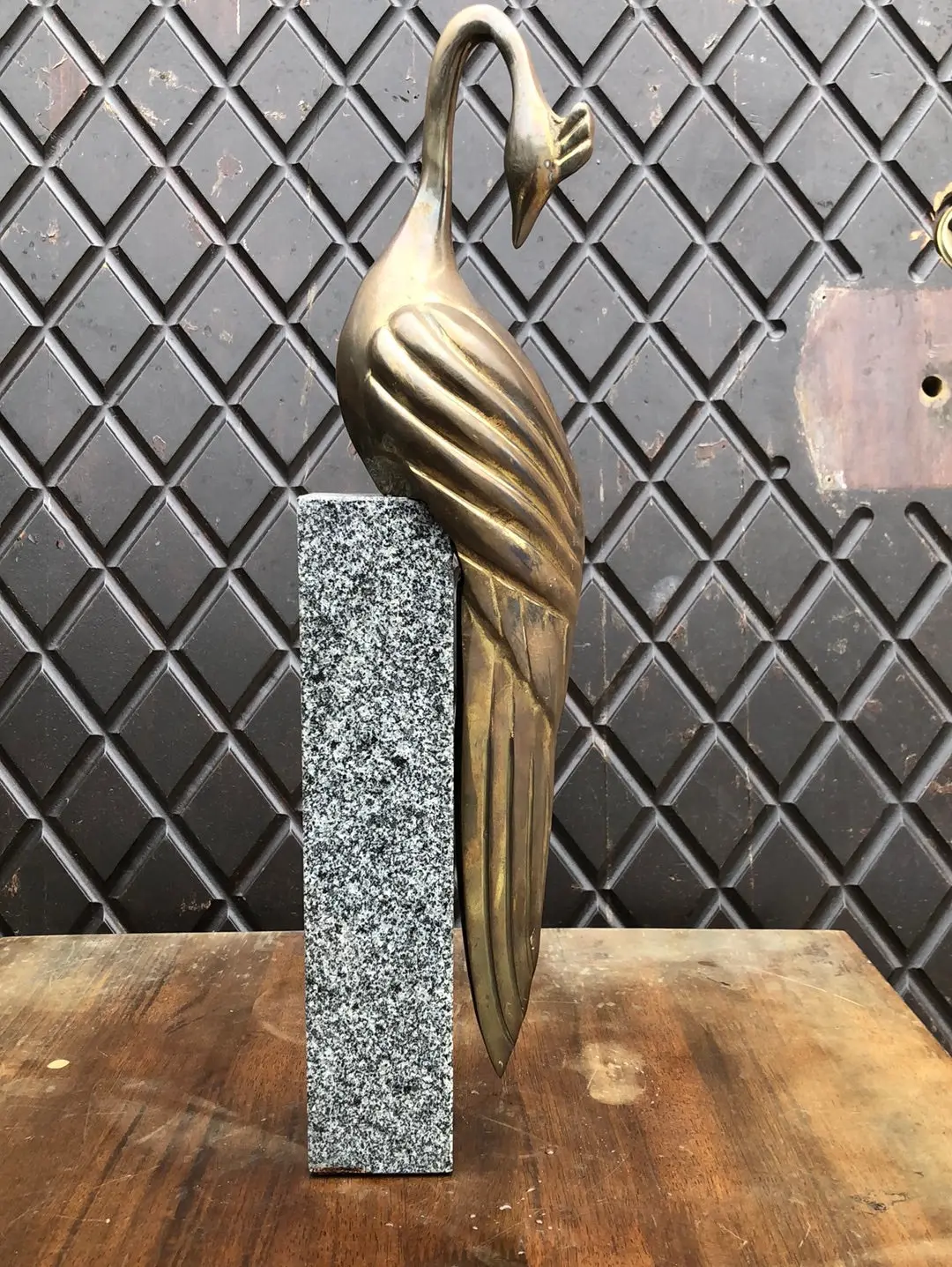 Statue Of Brass Bird On Granite 1