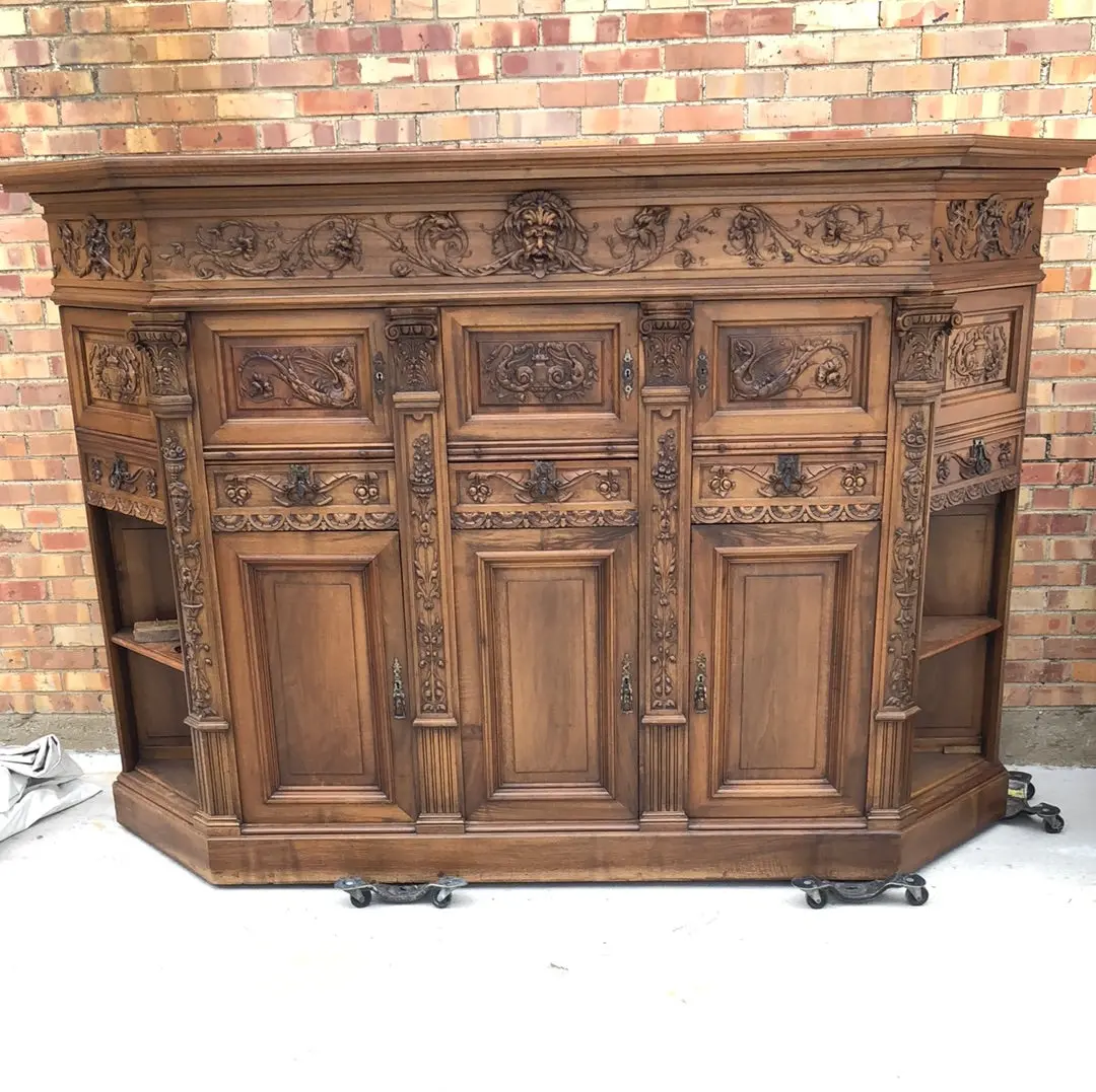 Walnut Griffin Carved Cabinet With Canted Ends 1