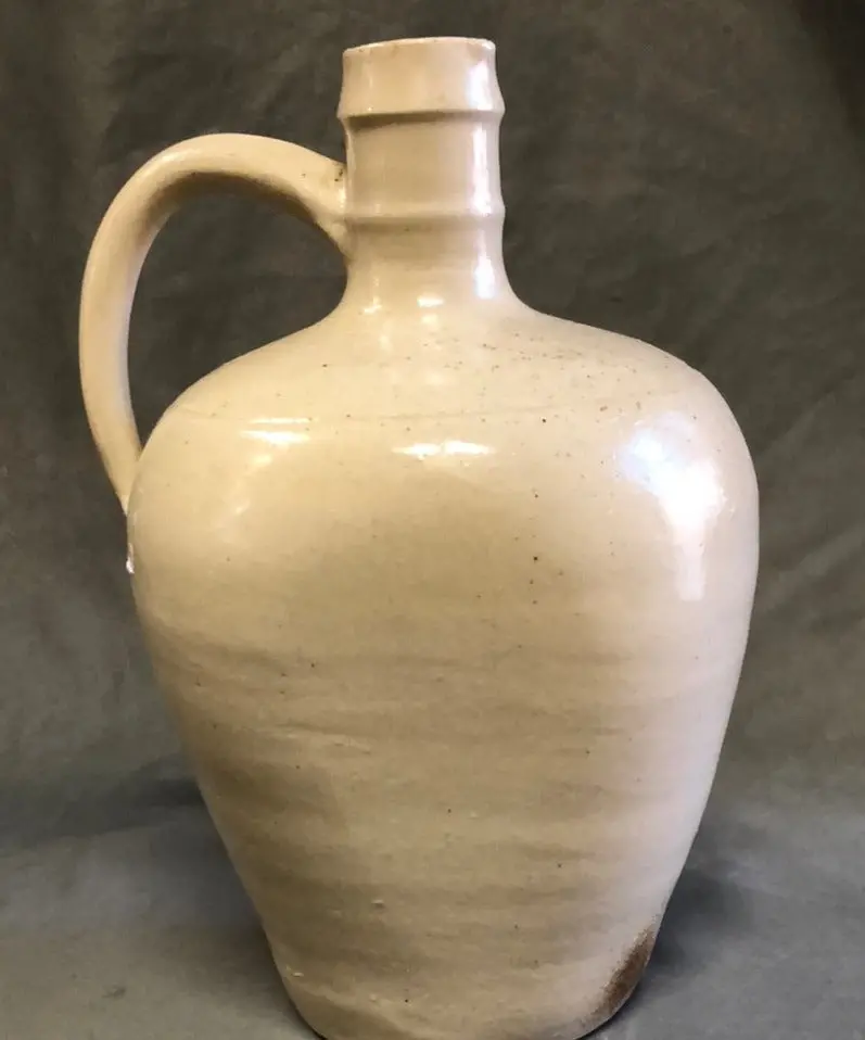 Hand Thrown White Pottery Jug With Flat Sides And Handle 1