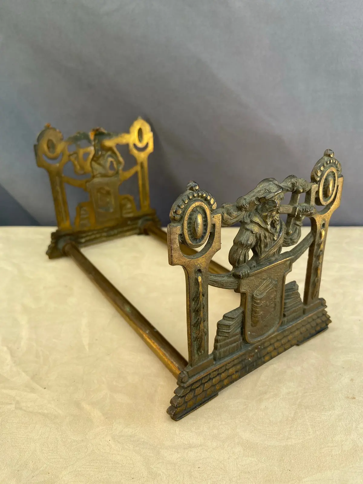 Sliding Metal Figural Book Rack 1