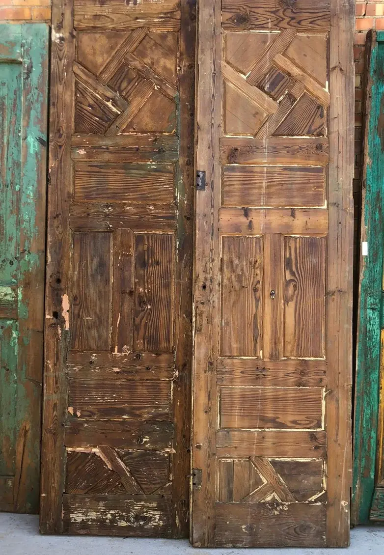 Pair Of Tall Raw Pine Paneled Diagonal Door 1