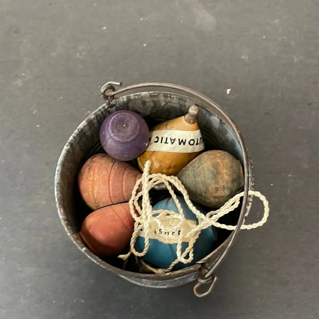 Gray Enamel Bucket With Old Tops 1