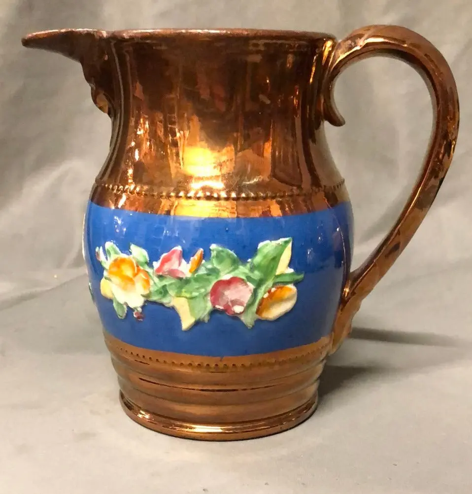 Medium Copper Luster Pitcher With Blue Band And Flowers In Relief 1