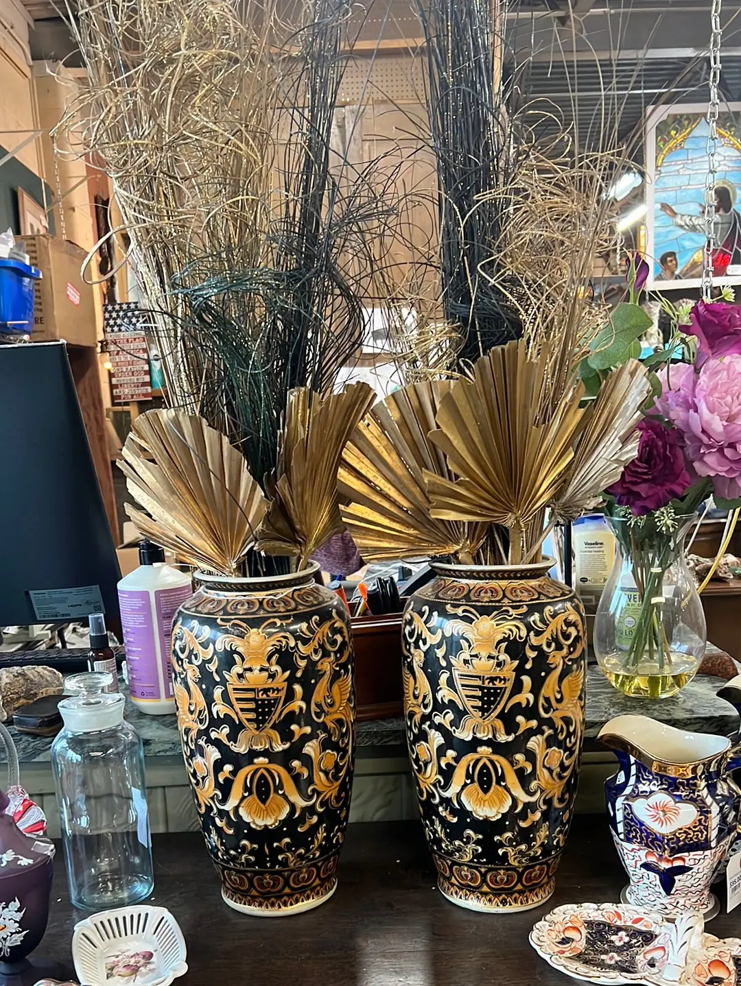 Pair Of Black And Gold Vases With Glittery Fans And Sticks Arrangements 1