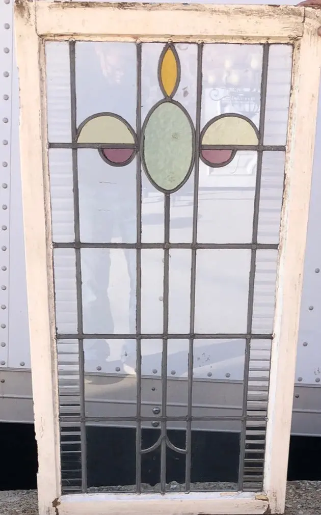 Tall Stained Glass Window With Green Oval And Yellow Half Ovals 1