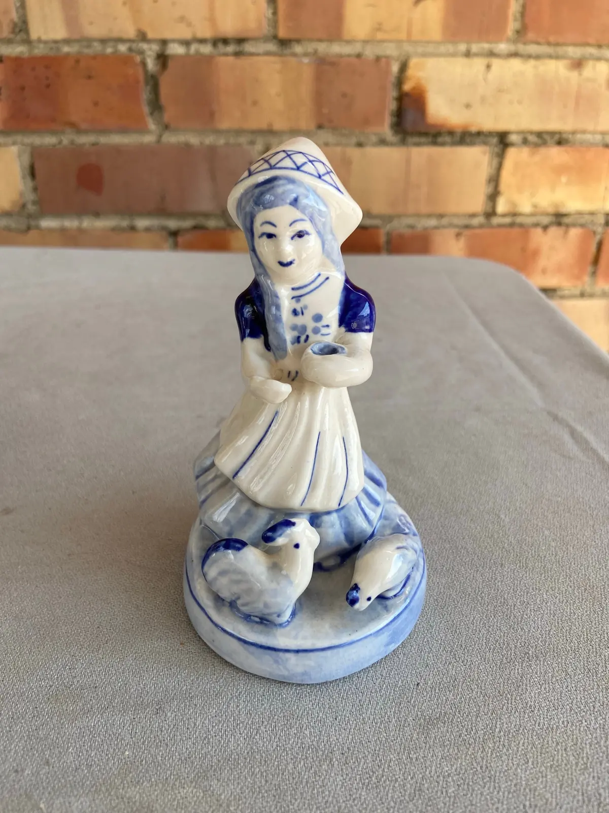Delft Figure Of Girl Feeding Chicken 1