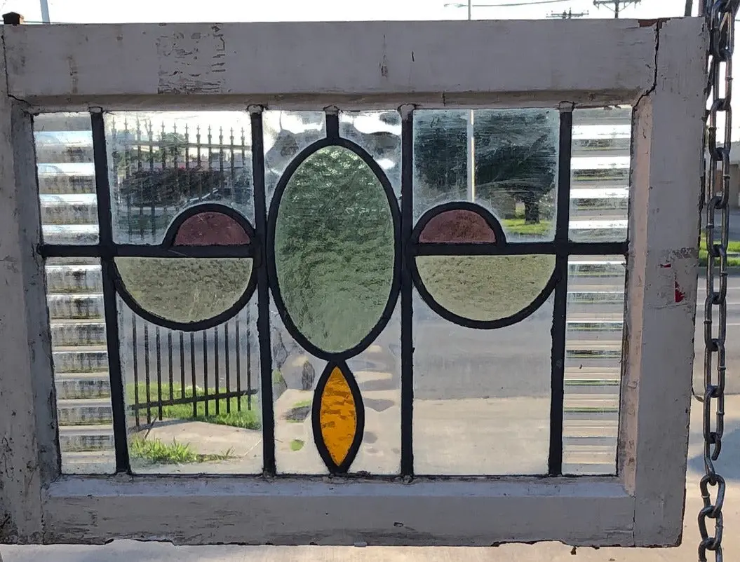 Stained Glass Window With Green Oval And Yellow Half Ovals 1