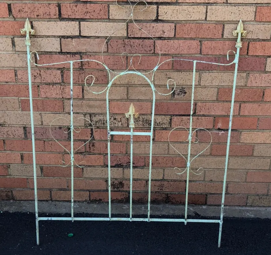 Fence Panel With 2 Fluer Di Lis On Posts And One In Center 1