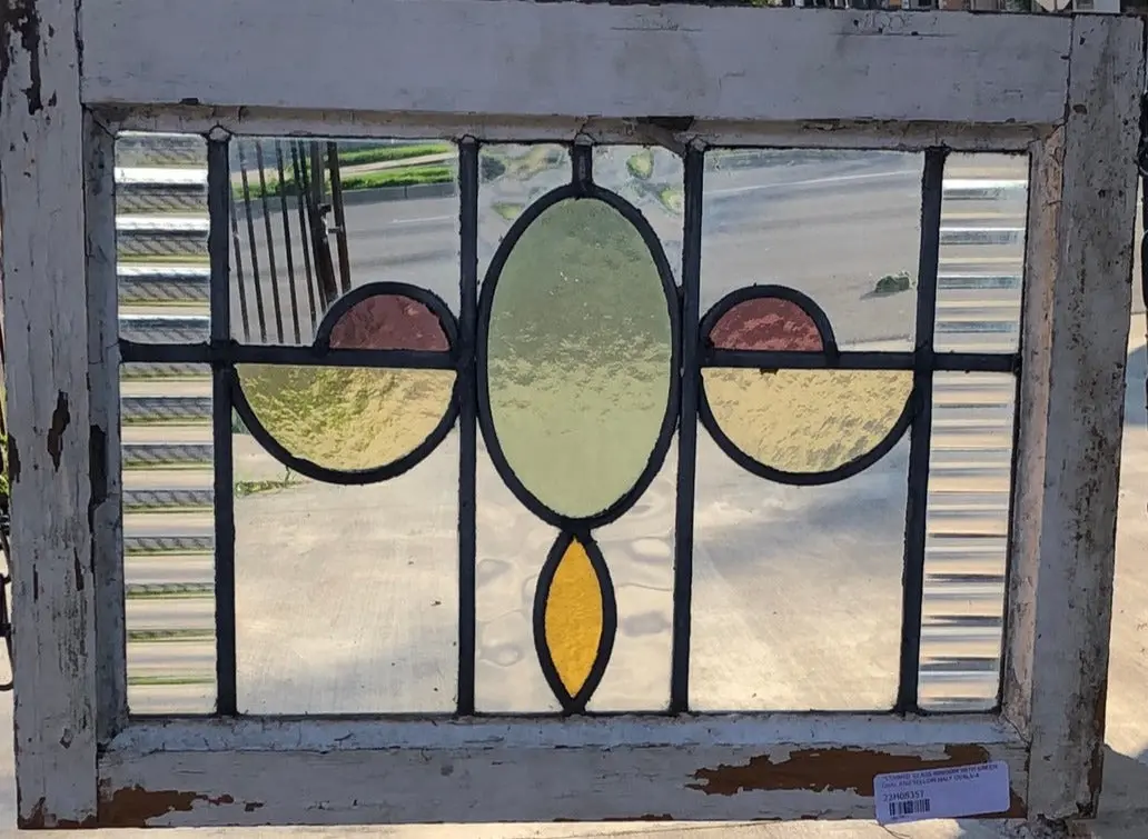 Stained Glass Window With Green Oval And Yellow Half Ovals 1