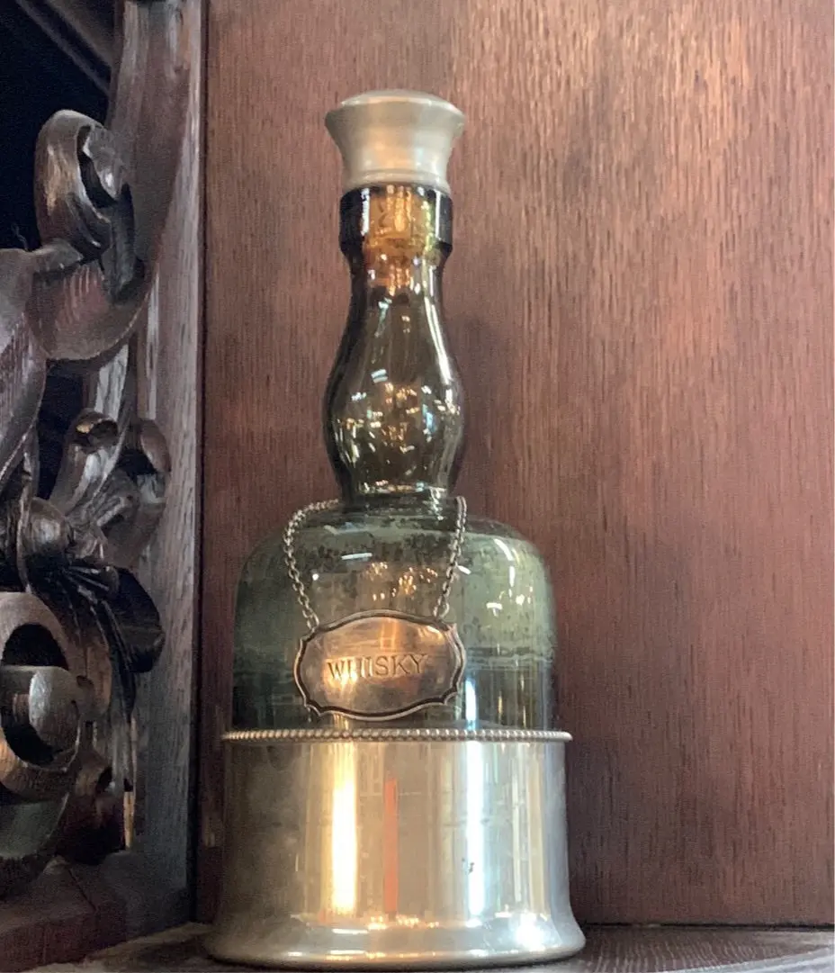 Green Whiskey Bottle With Silver Lable 1