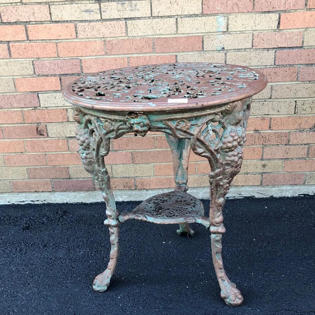 Cast Iron Pub Table With Grapes 1