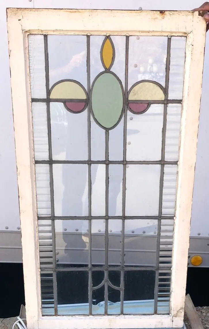 Tall Stained Glass Window With Green Oval And Yellow Half Ovals 1