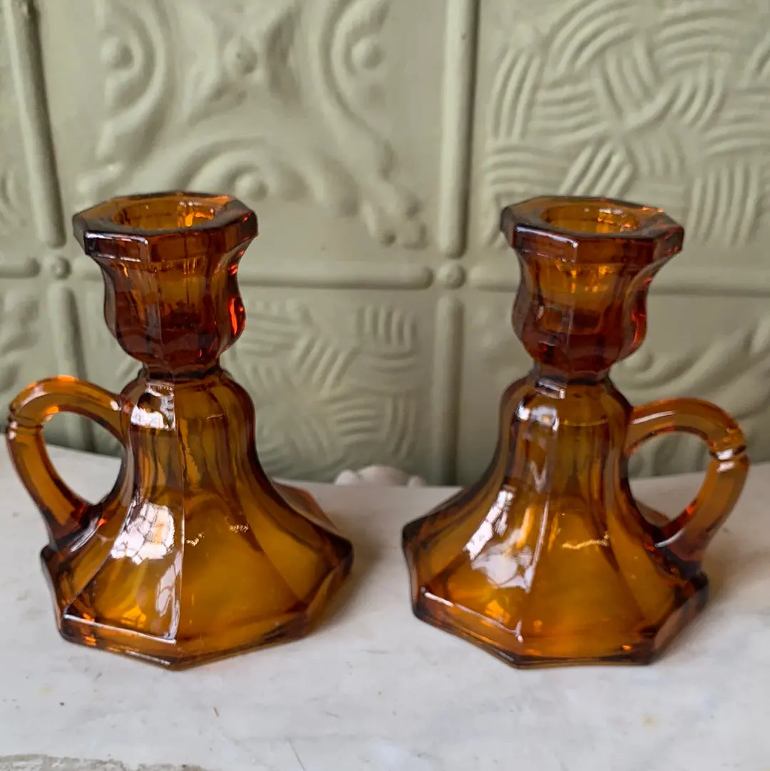Pair Of Amber Glass Candle Sticks 1
