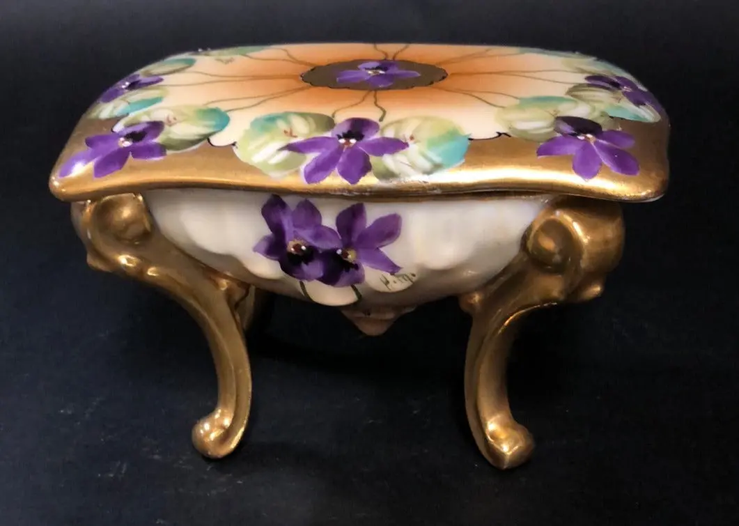 Hand Enameled And Gilt Purple Flowers Porcelain Box On Legs 1
