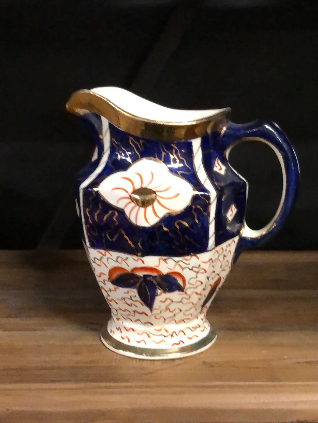 Gaudy Welch Orange And Blue Pitcher 1